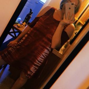 Dress with open sleeves